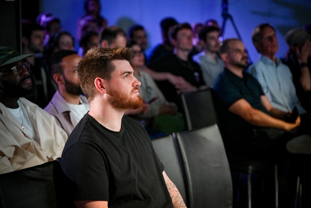 Shot of the crowd listening to the keynote presentation.